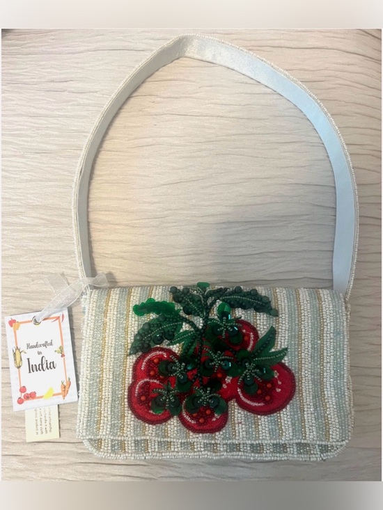 India Handbags - Beaded Tomato Garden Bag
Handmade In India NEW Release
Viral Striped Purse